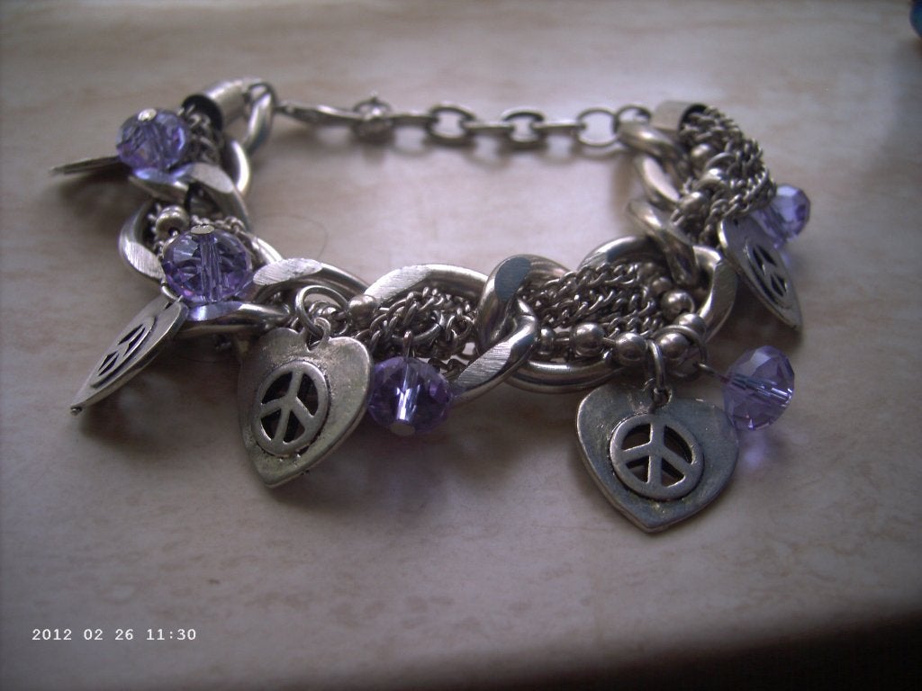 Een Zilverkleurige Armband met Bedels en Lila kraaltjes, Sieraden, Tassen en Uiterlijk, Antieke sieraden, Verzenden, Zilver, Ring