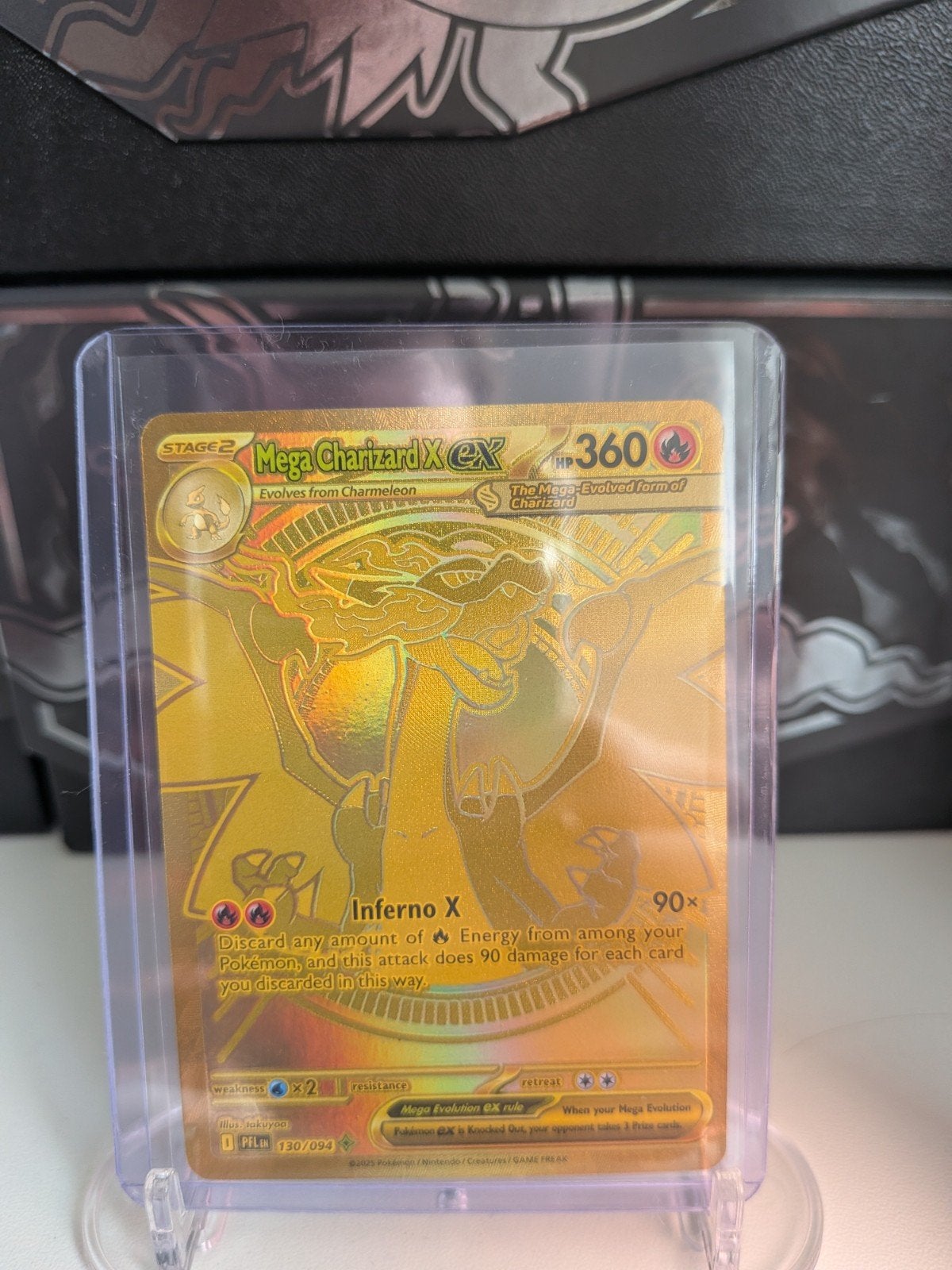 Mega Charizard X EX Gouden Pokémon Kaart 130/094, Ophalen of Verzenden, Zo goed als nieuw, Losse kaart, Foil