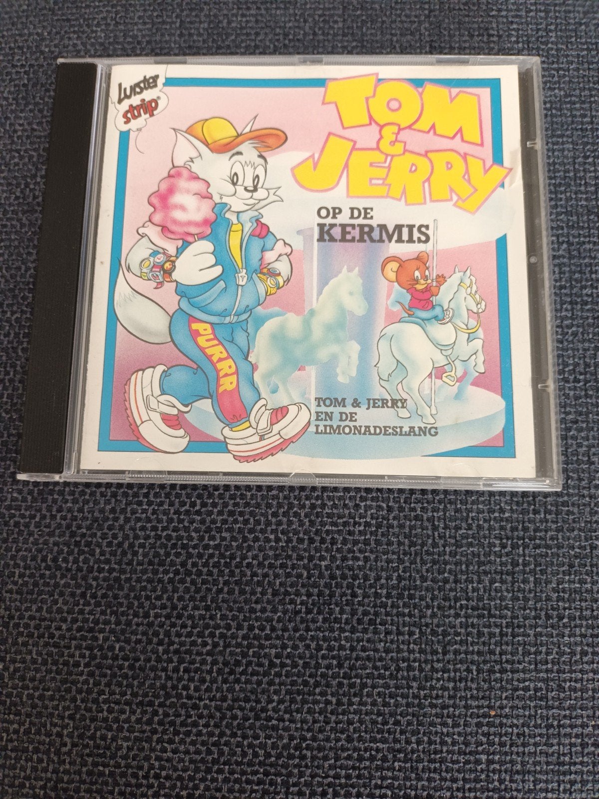 TOM & JERRY - OP DE KERMIS . EN DE LIMONADESLANG - JTJCD 02, Ophalen of Verzenden, Zo goed als nieuw, Luisterboek