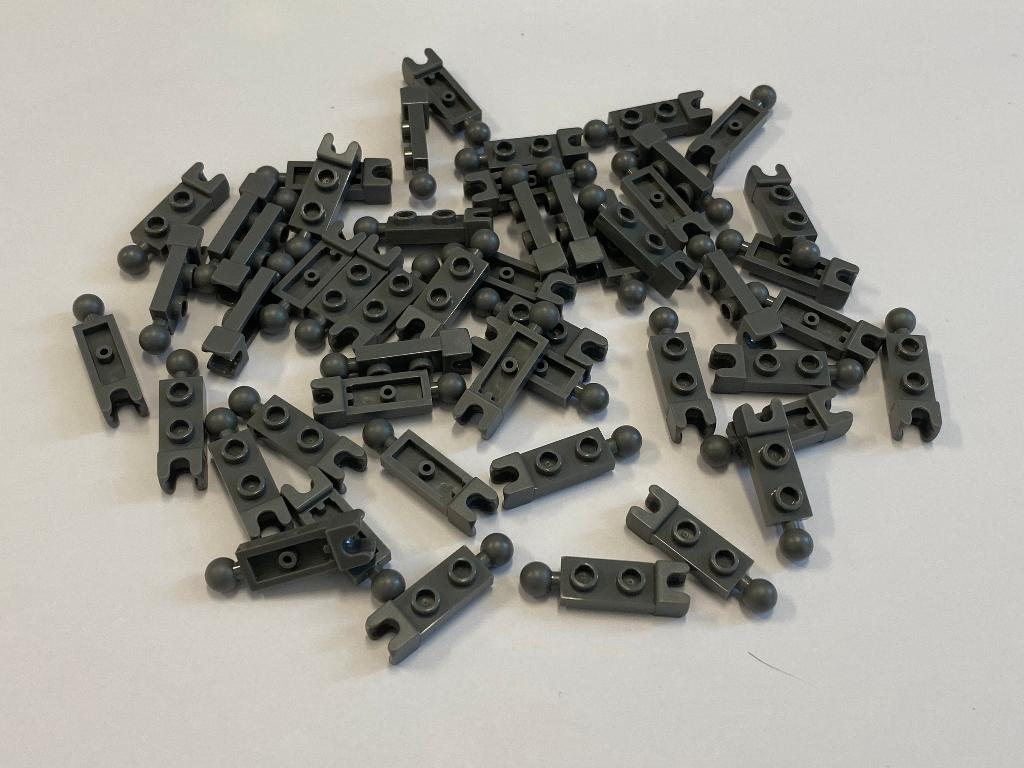 Partij 50x nieuwe donker grijze 1x2 lego plaatjes balhouder