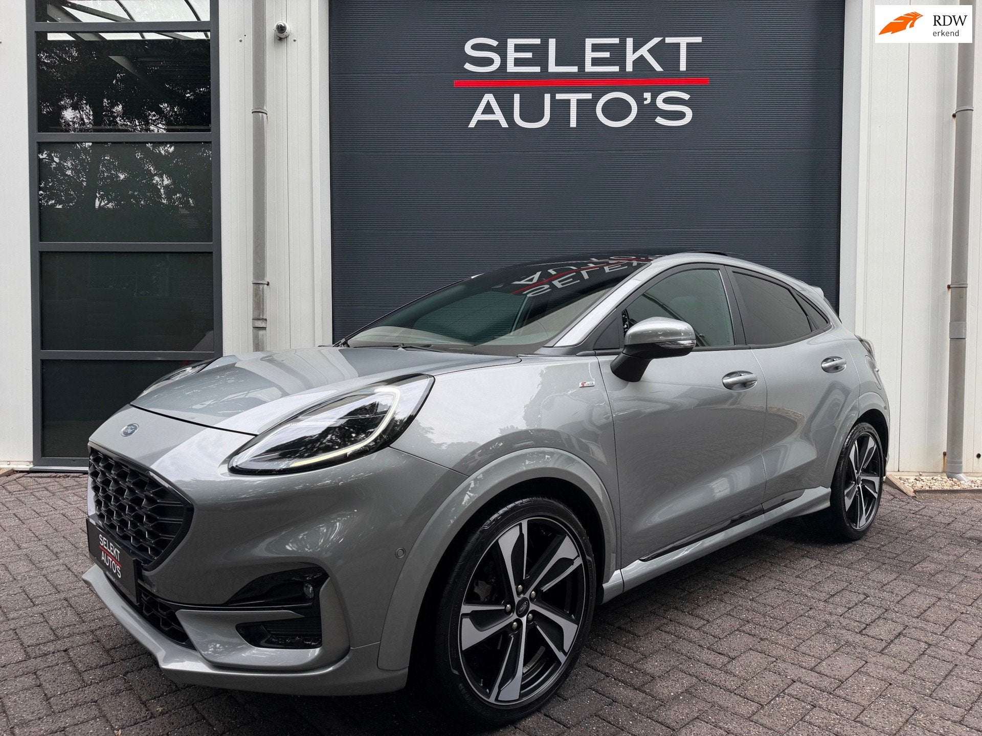 Ford Puma 1.0 EcoBoost Hybrid ST-Line X 155 Pk Pano/B&O/LED/, Auto's, Ford, Voorwielaandrijving, Zwart, Leder en Stof, 23 km/l