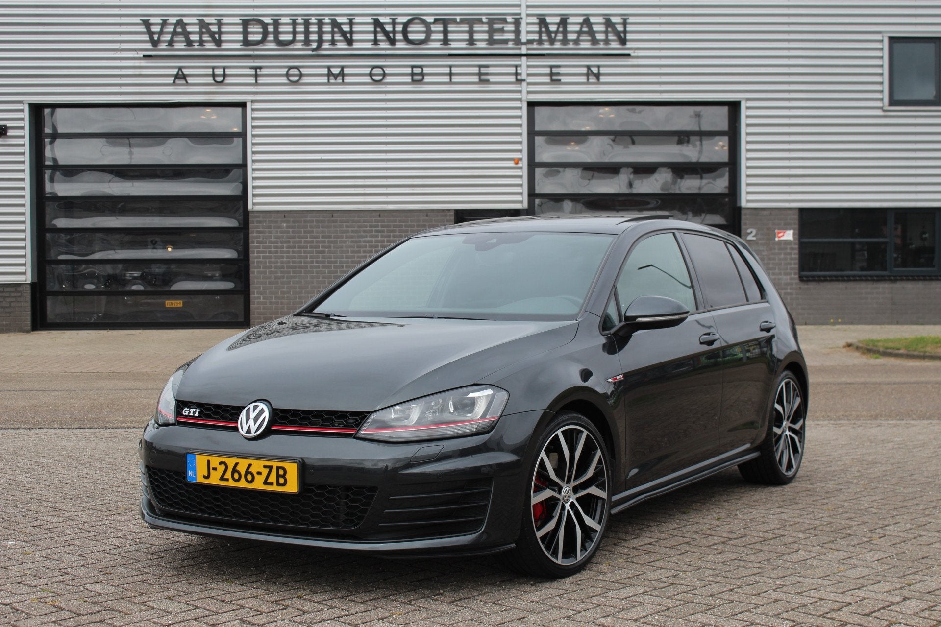 Volkswagen Golf 2.0 TSI GTI / Panoramadak / Stoelverwarming, Auto's, Volkswagen, Stof, Gebruikt, 4 cilinders, Zwart