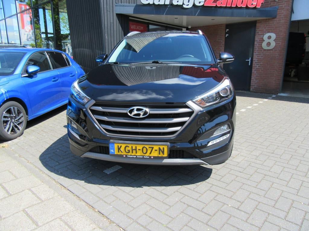 Hyundai TUCSON 1.6 T-GDi Comfort 4WD, Auto's, Hyundai, Gebruikt, 4 cilinders, Leder en Stof, Zwart