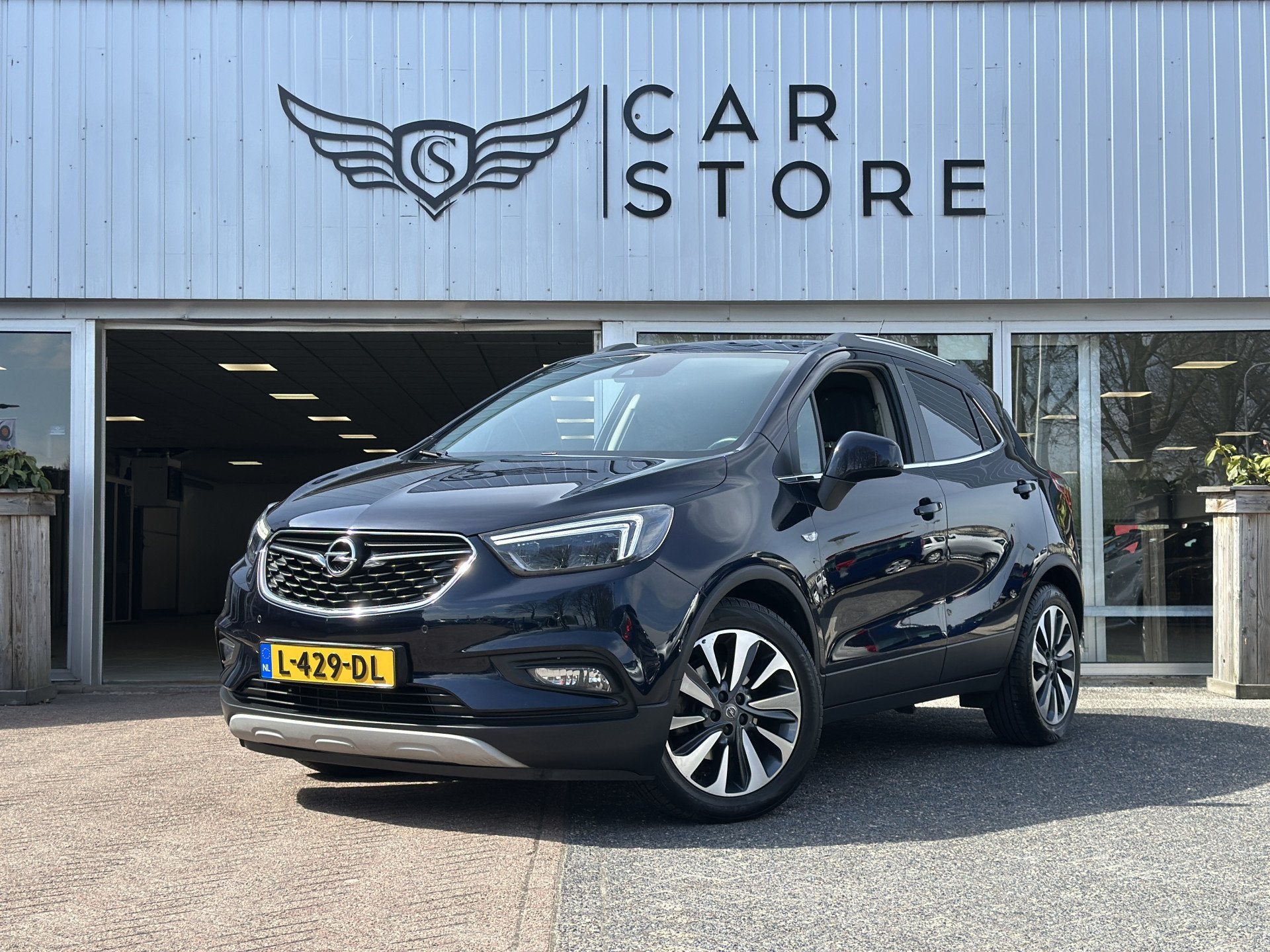 Opel Mokka X 1.4 Turbo 120 Jaar Edition |CARPLAY|CRUISE|CAME, Auto's, Voorwielaandrijving, Gebruikt, Euro 6, Blauw