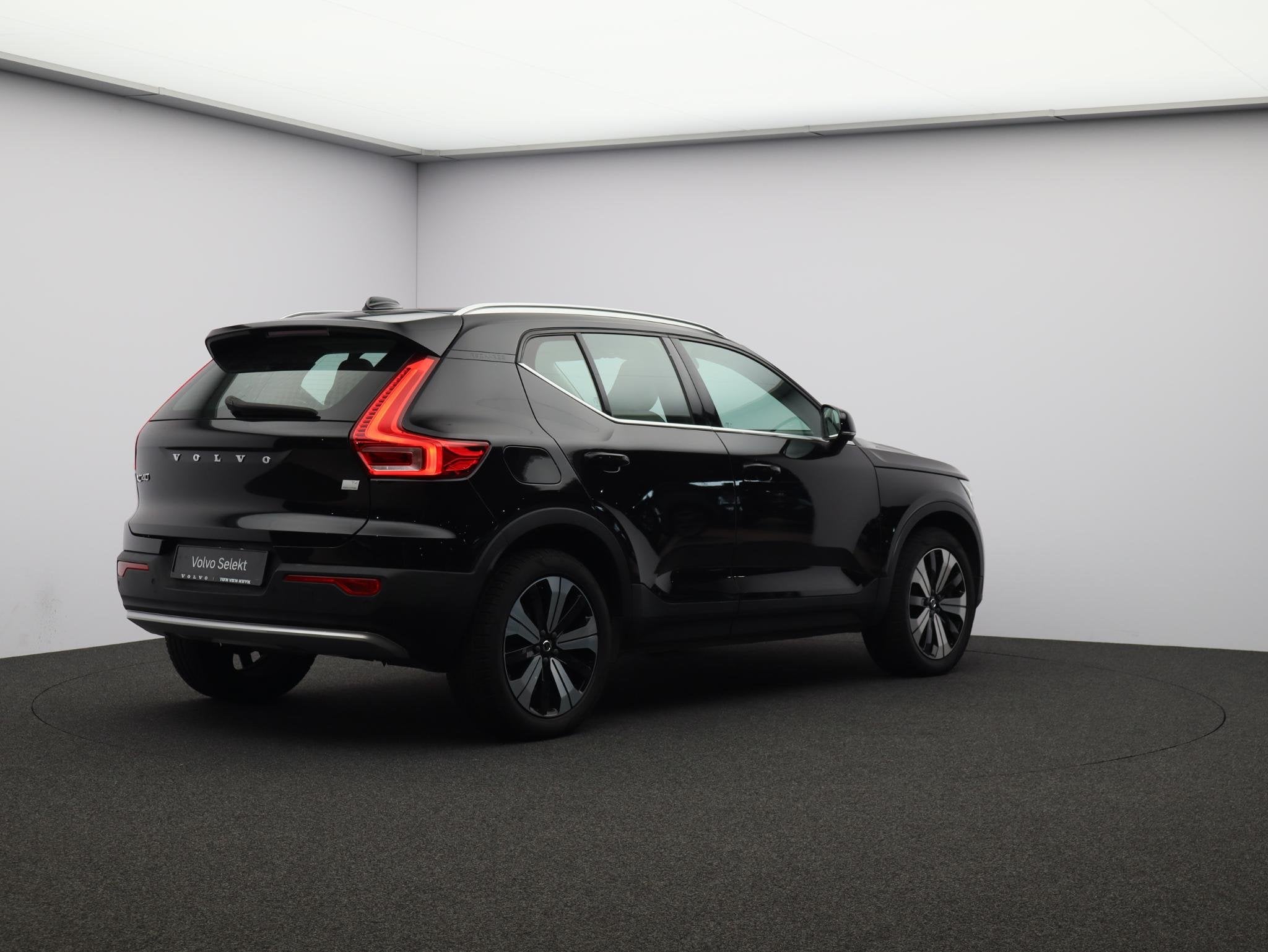 Volvo XC40 1.5 T4 Plug-in hybrid Plus Bright / Panoramadak /, Auto's, Stof, 1712 kg, Met garantie (alle), Zwart