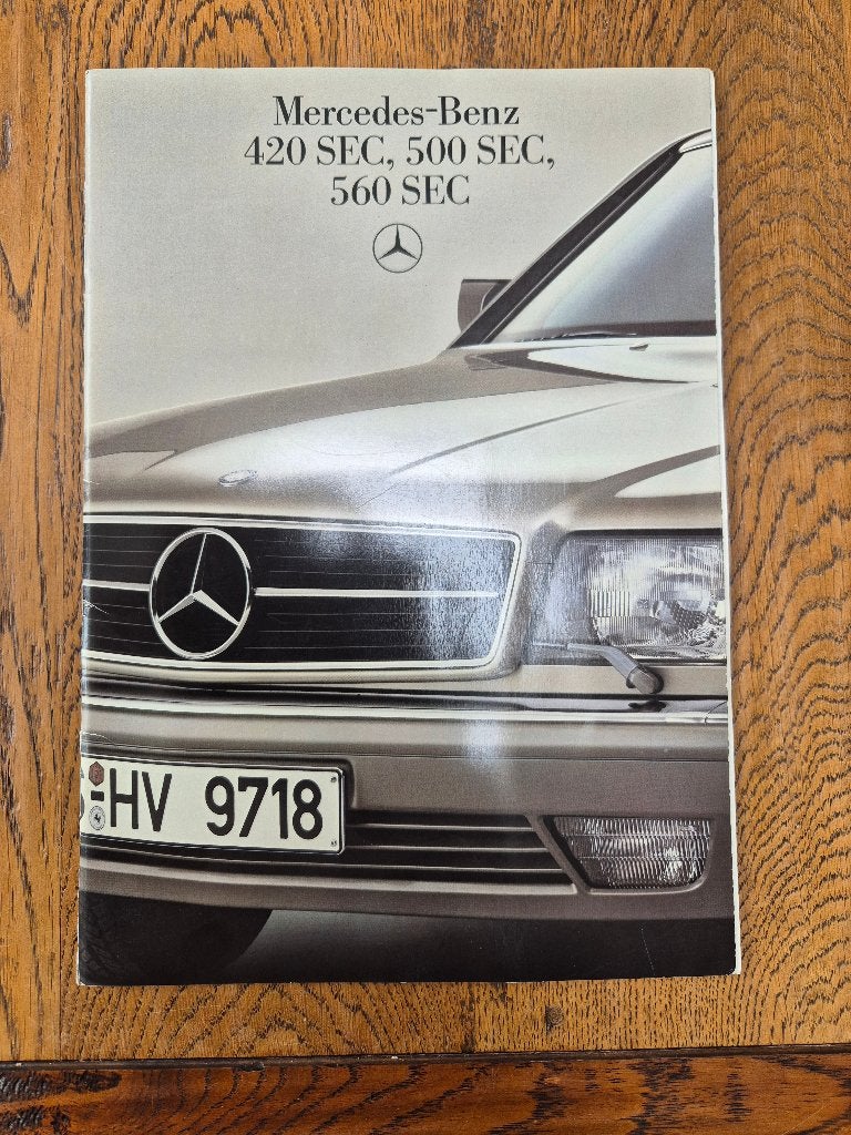Mercedes W126 SEC folder. Zeldzame Nederlandse versie., Ophalen of Verzenden, Zo goed als nieuw, Mercedes