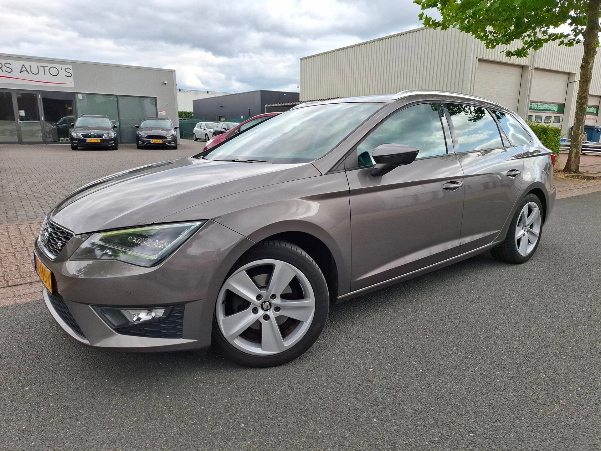 Seat Leon ST 1.4 EcoTSI FR Connect CLIMA/CRUISE/NAVI/CAMERA!, Auto's, Lichtsensor, Gebruikt, 4 cilinders, 150 pk