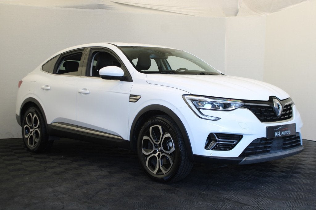 Renault Arkana 1.6 E-Tech Hybrid 145 Intens Groot navi, Auto's, Renault, Arkana, Stof, Gebruikt, Zwart