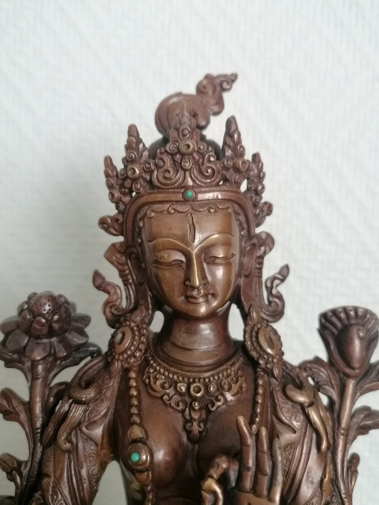bronze gepatineerde buddha, Ophalen