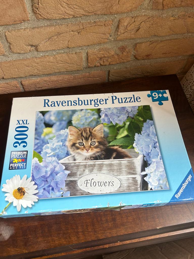 Ravensburger puzzel kat met bloemen 9+, Ophalen of Verzenden