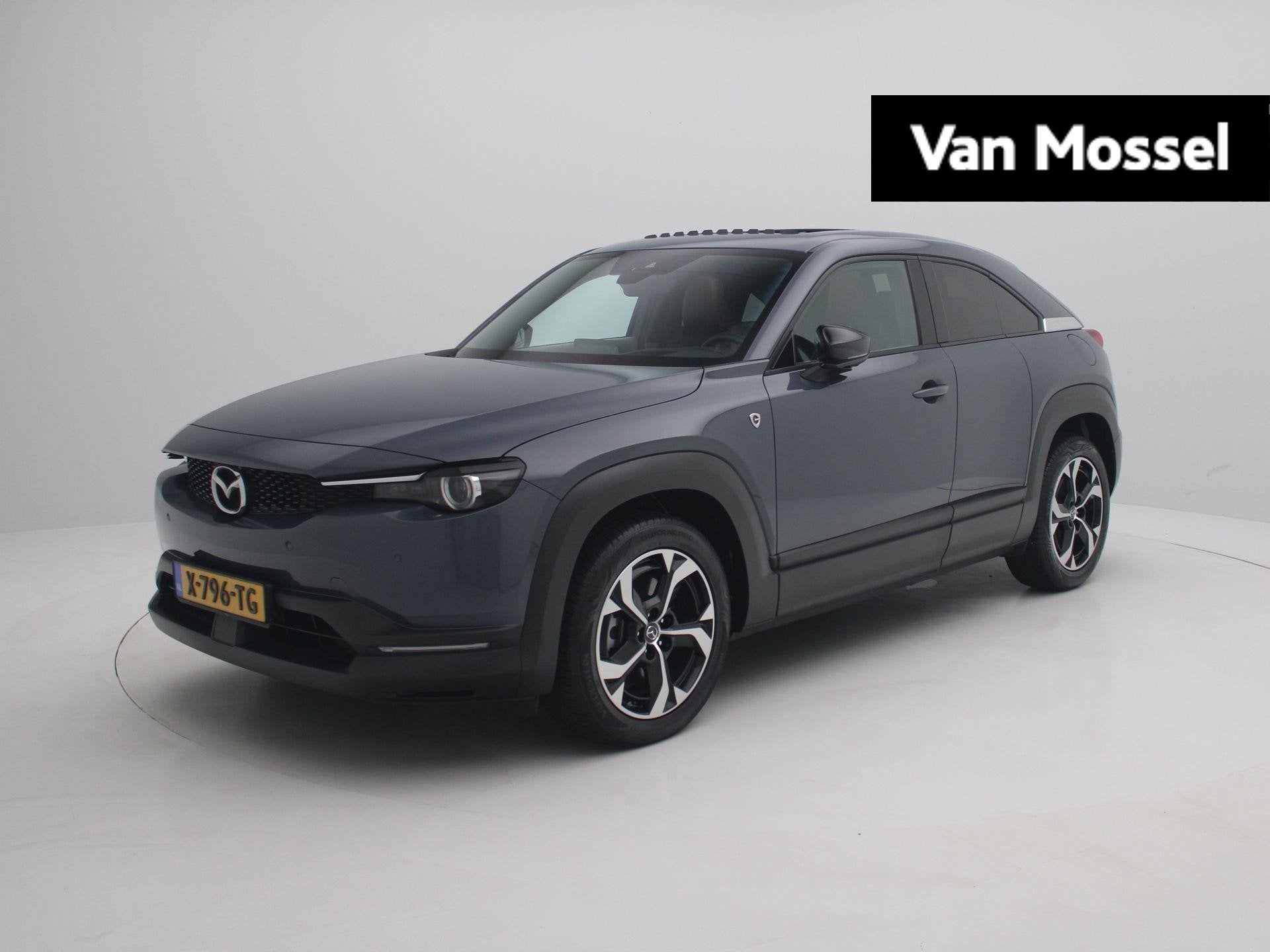 Mazda MX-30 e-SkyActiv R-EV 170 Makoto | Navi | Premium Pack, Auto's, Mazda, Gebruikt, Leder en Stof, Bedrijf, Hybride Elektrisch/Benzine