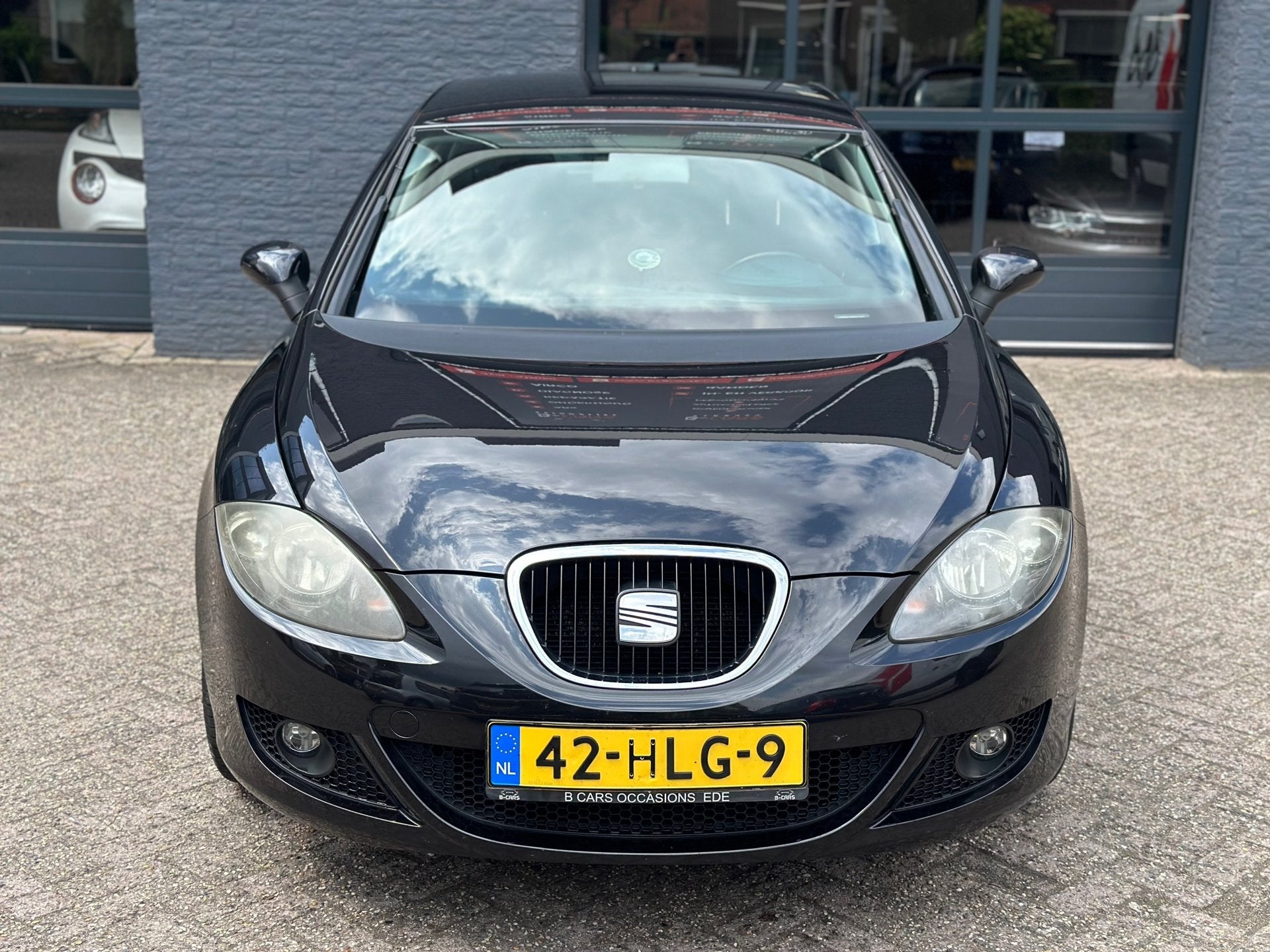 Seat Leon 1.6 25 Edition I Airco|Cruisec|Nap|Navi|Carplay, Auto's, Seat, Gebruikt, 4 cilinders, Leon, Zwart