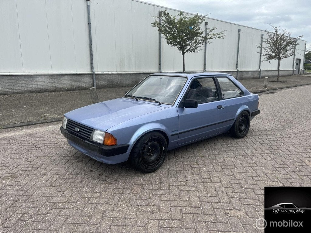 Ford Escort 1.3 Laser 1985, Auto's, Ford, Escort, Gebruikt, 4 cilinders, Bedrijf