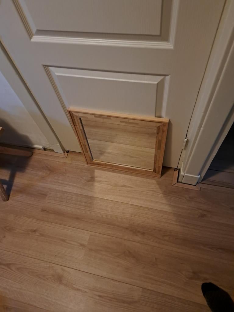 Houten spiegel, Ophalen