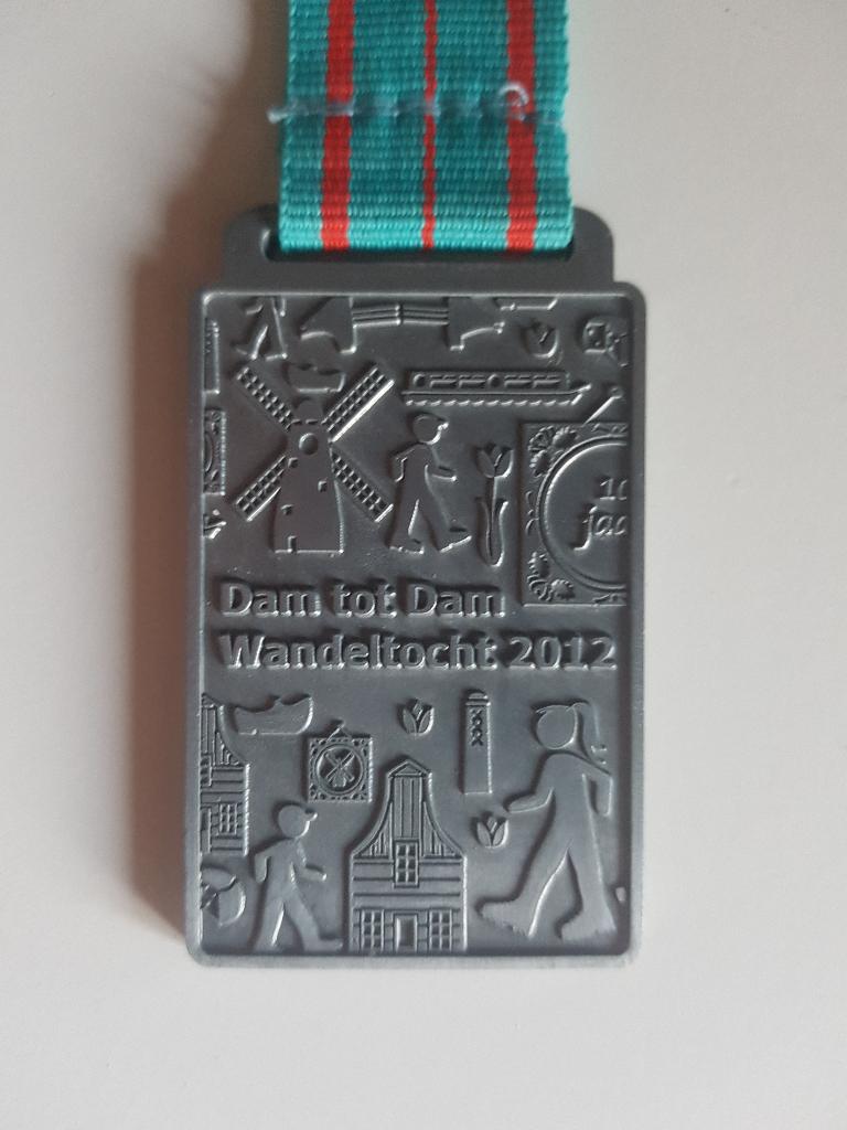 Dam tot Damloop medaille 2012, Ophalen of Verzenden, Overige materialen