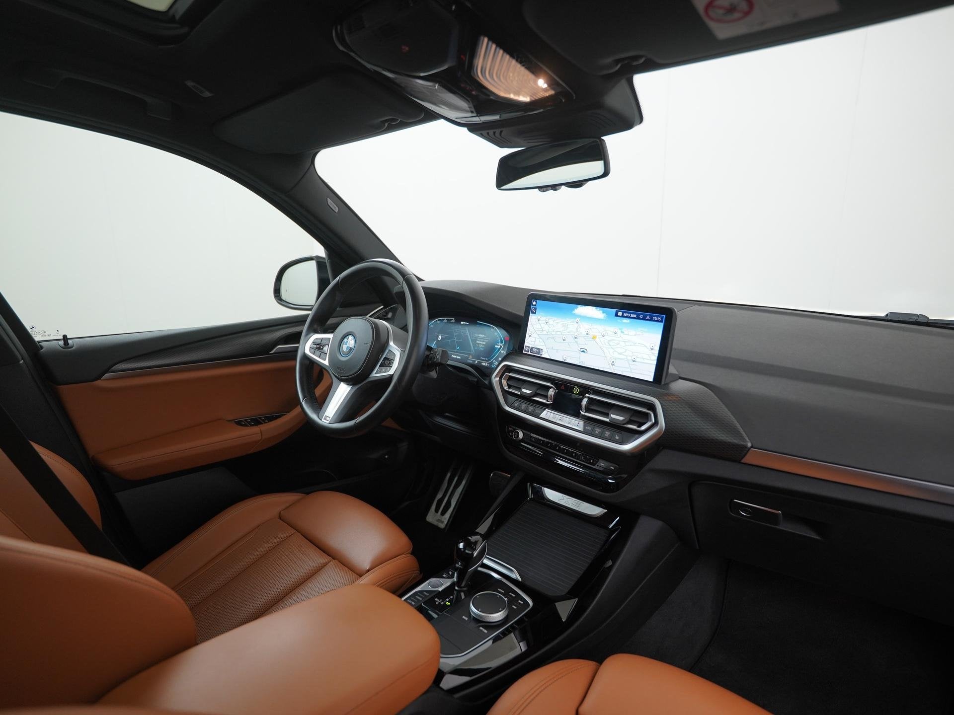 BMW X3 xDrive30e M Sport Shadow | Panoramadak | Leder | Live, Auto's, Gebruikt, 4 cilinders, Zwart, Plug-in hybride