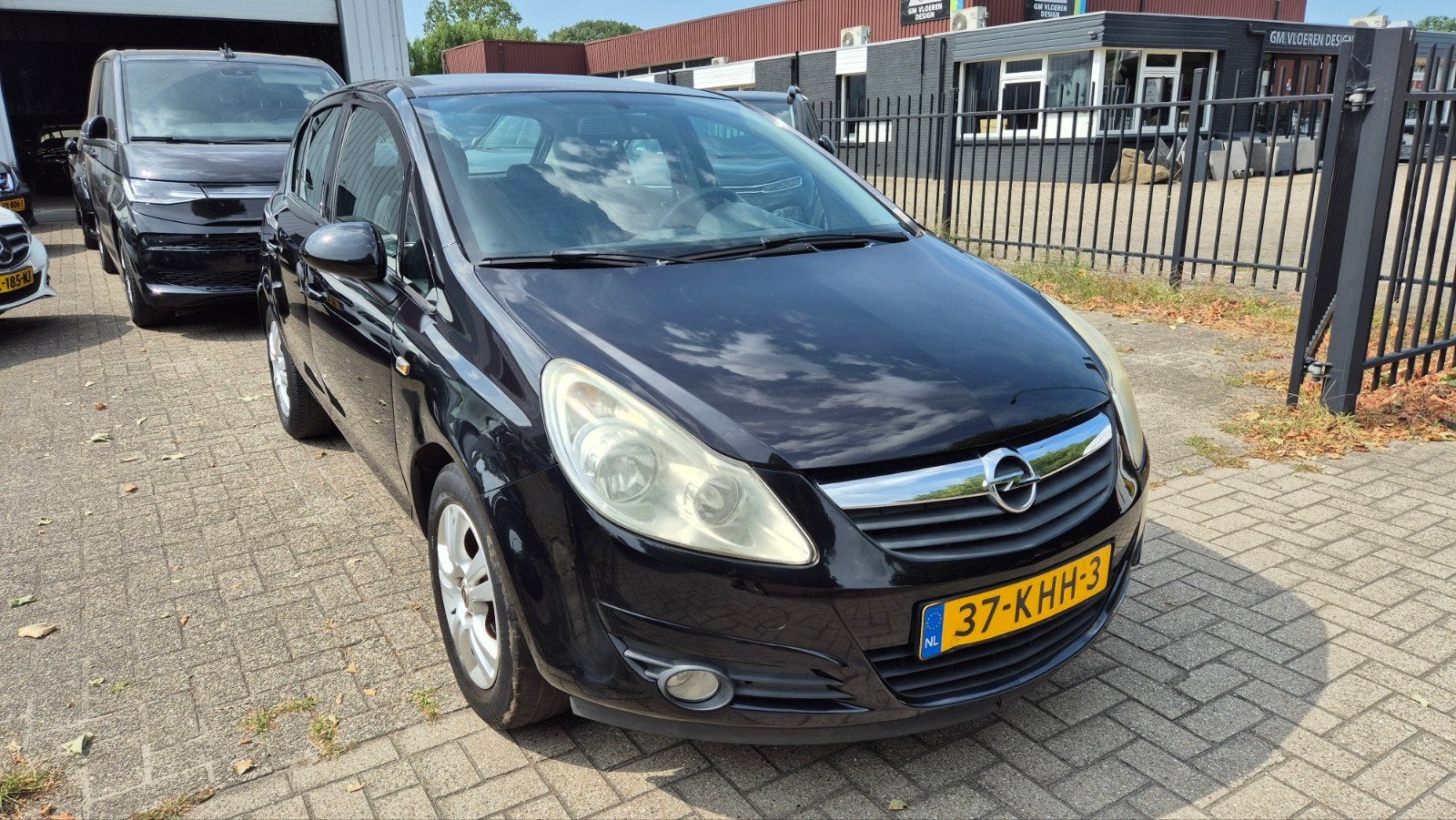 Opel Corsa 1.4 16V 5D 2009 Zwart AIRCO + NAP + APK, Auto's, Opel, Particulier, Corsa, ABS, Airbags, Airconditioning, Alarm, Boordcomputer