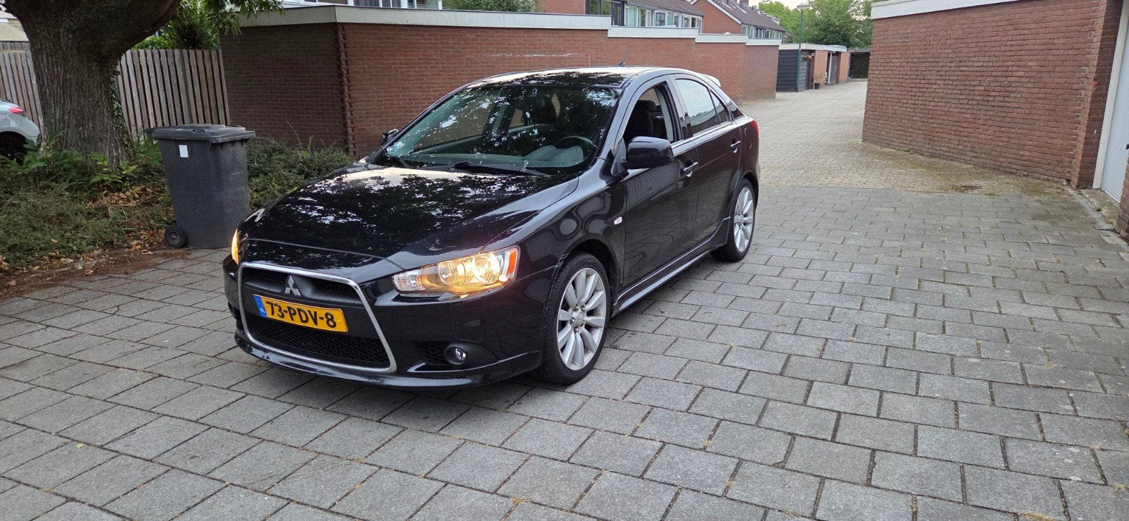 Mitsubishi Lancer 1.8 Mivec Sportback 2011 Zwart, Auto's, 1330 kg, Stof, Zwart, Zwart