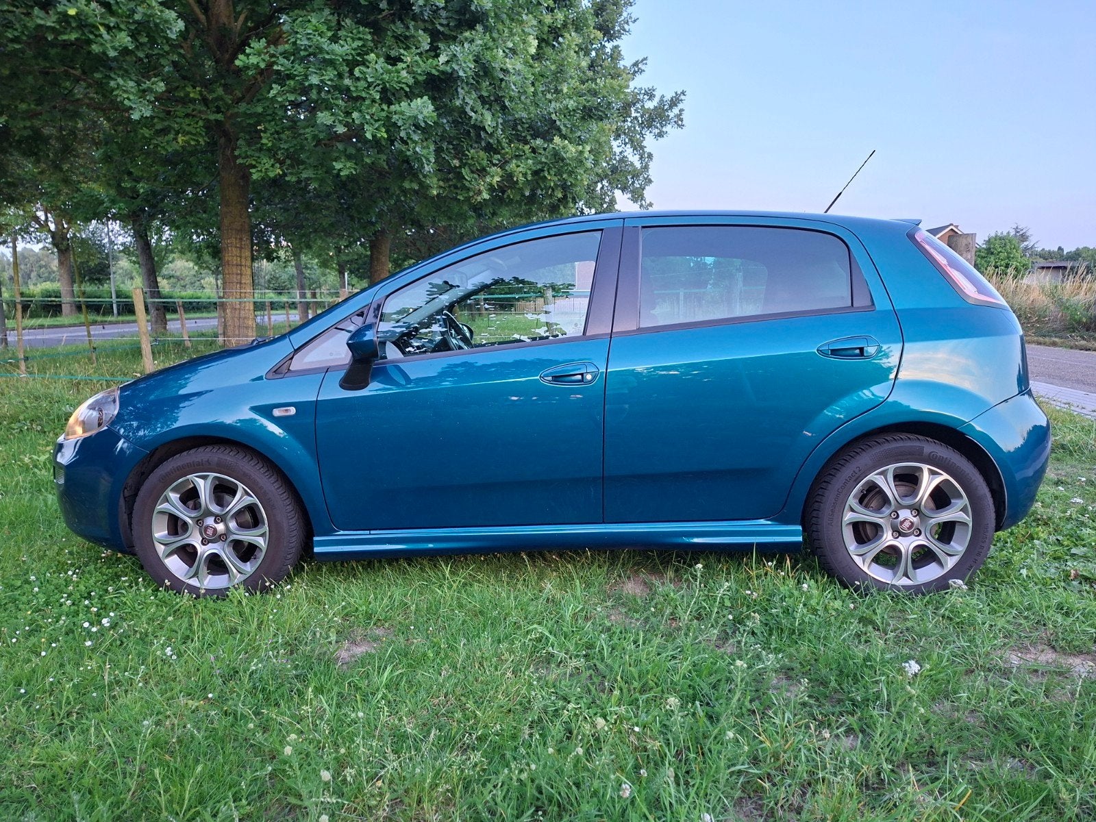 Fiat Punto 0.9 Twinair 74KW 5DR 2014 Blauw, Auto's, Voorwielaandrijving, 100 pk, 49 €/maand, Origineel Nederlands