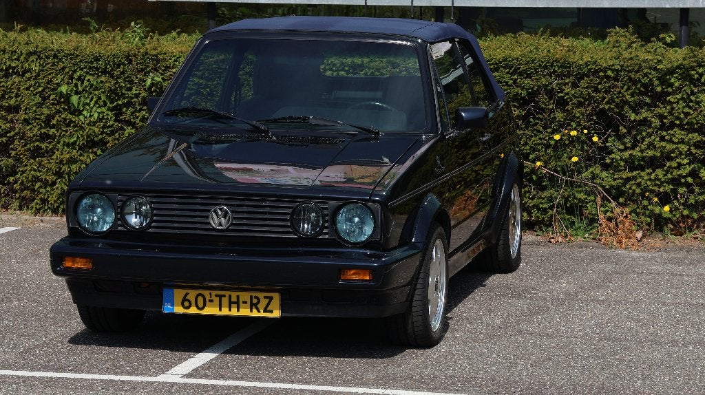 Volkswagen Golf 1.8 Cabriolet 72KW Etienne Aigner 1990 blauw, Auto's, Voorwielaandrijving, Stof, 4 cilinders, Cabriolet