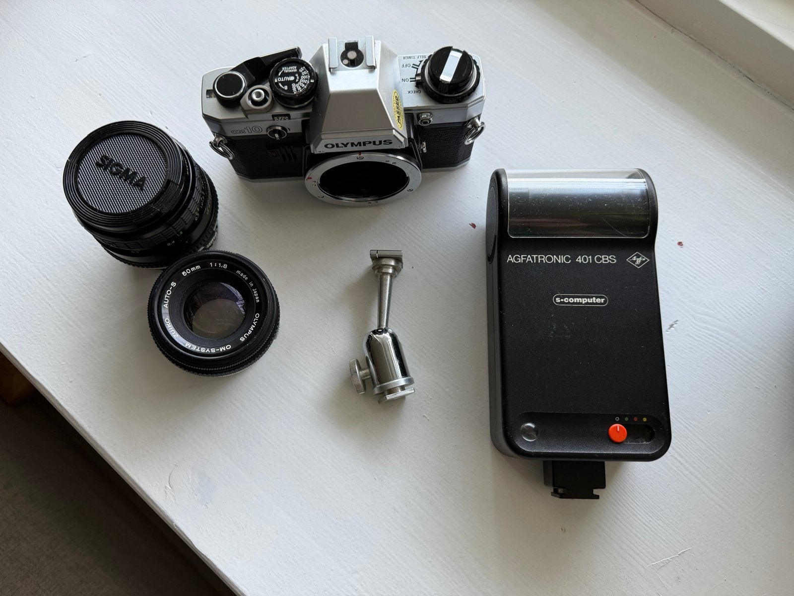 Olympus OM10 Spiegelreflexcamera met 50mm lens en flitser, Ophalen of Verzenden, Gebruikt, Spiegelreflex, Olympus