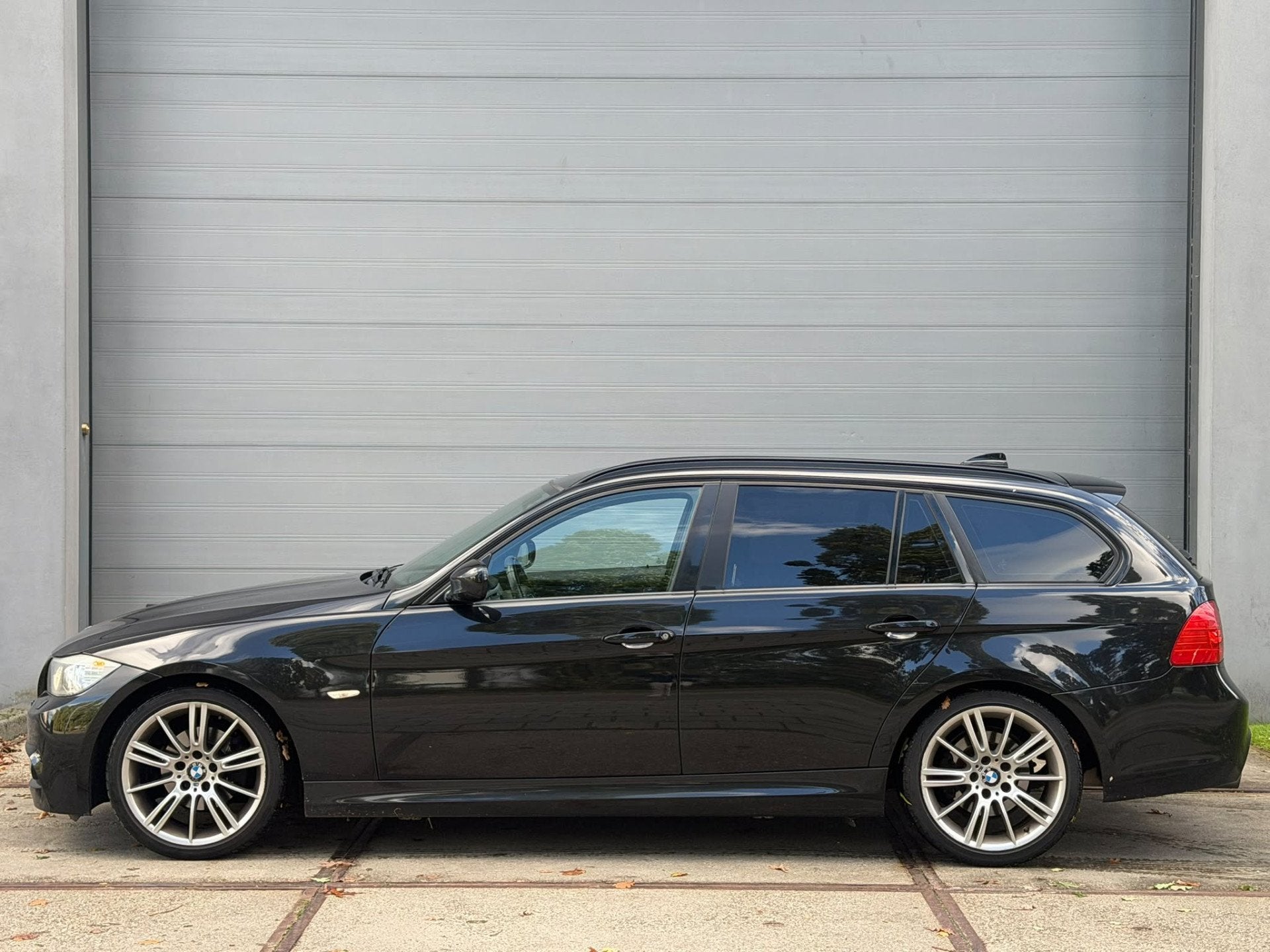 BMW 3 Serie Touring 318i Corporate Lease M Sport Edition, Euro 5, Zwart, 4 cilinders, Alcantara