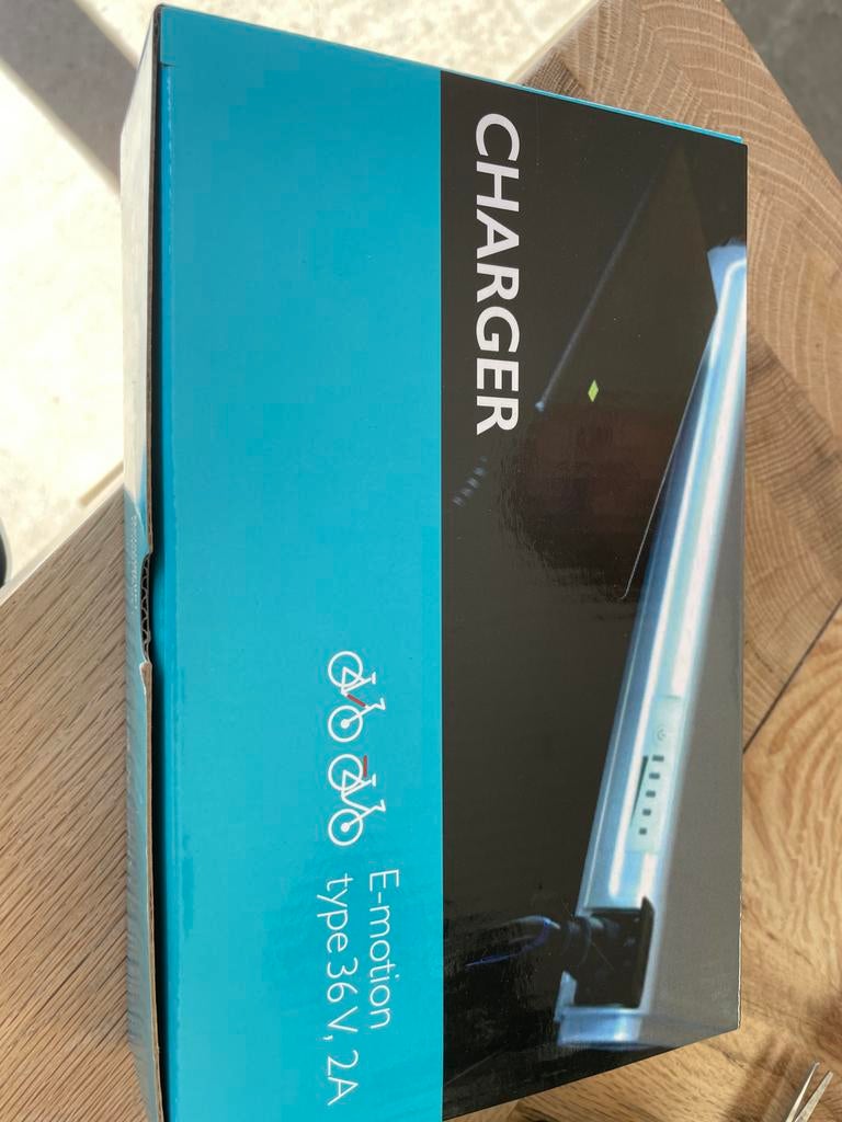 Nieuwe E-motion E-bike Oplader 36V, 2A, Ophalen of Verzenden, Nieuw