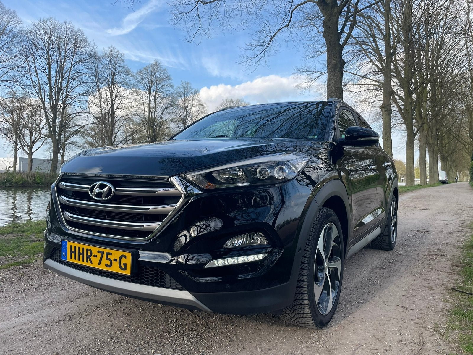 Hyundai Tucson 1.6 T-GDI Premium 4WD trekhaak bombol! 177 PK, Auto's, 4 cilinders, Zwart, Leder, Vierwielaandrijving