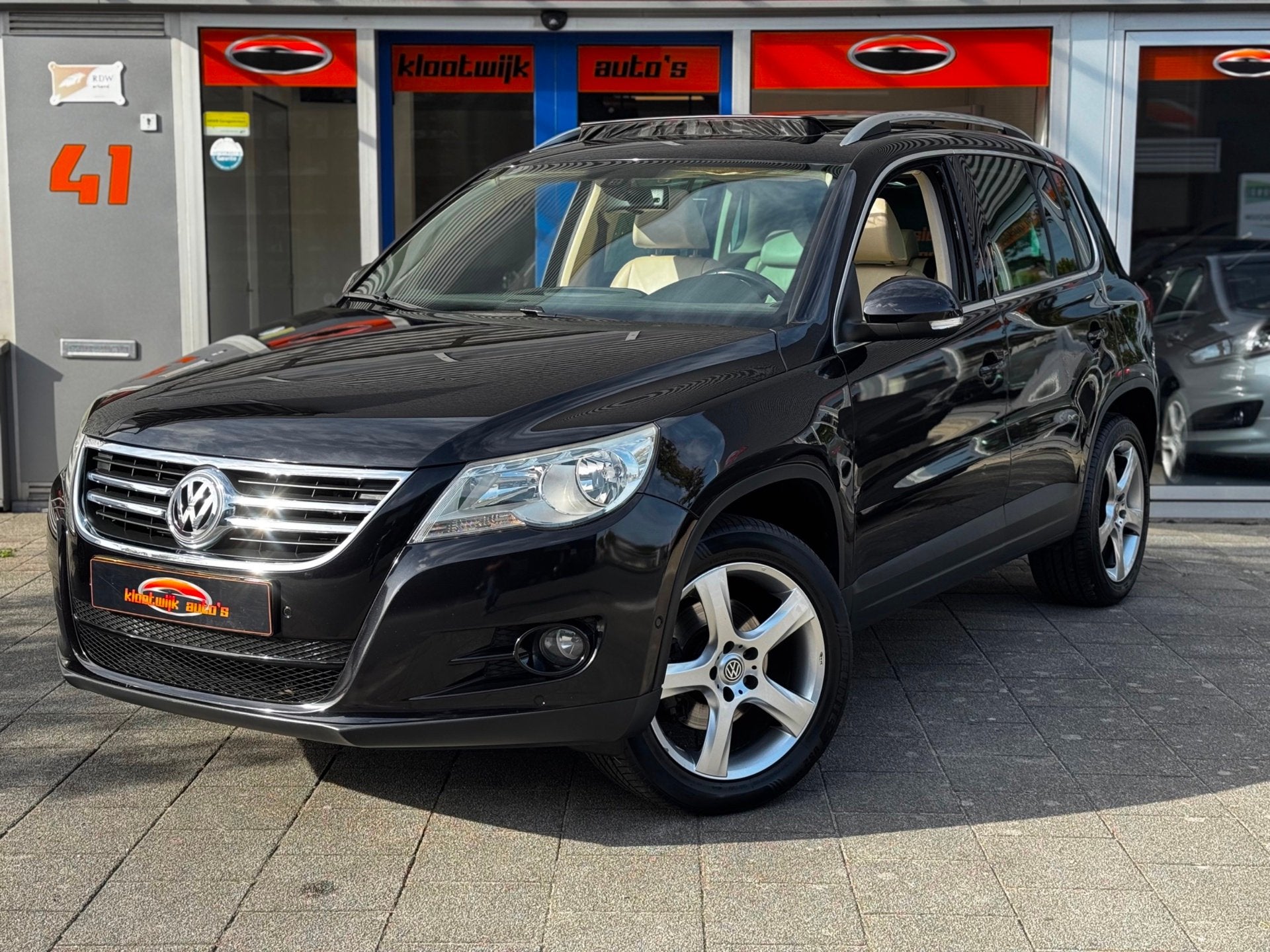 Volkswagen Tiguan 2.0 TSI Sport&Style 4Motion DSG Panorama L, Auto's, Automaat, Gebruikt, Beige, 4 cilinders