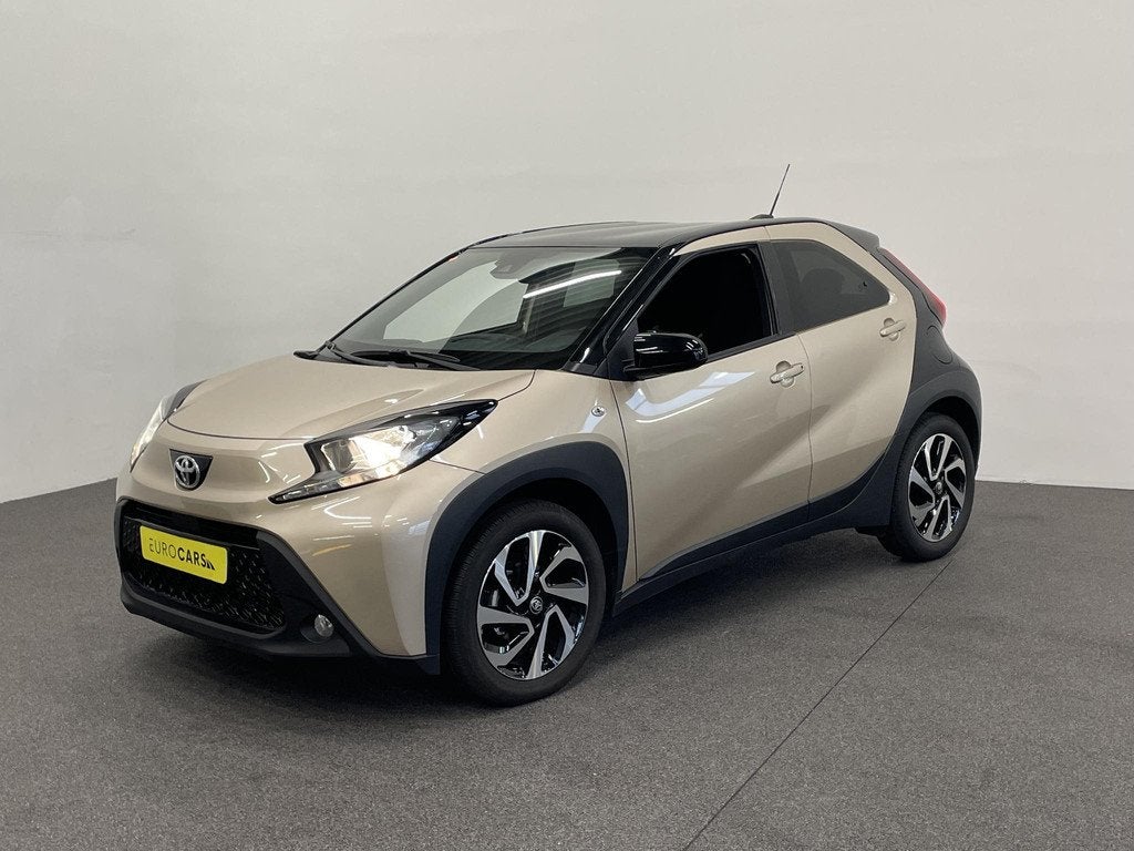 Toyota Aygo X 1.0 VVT-i Automaat Pulse Navigatie Apple Carpl, Auto's, Toyota, Stof, Gebruikt, Bruin, 4 stoelen
