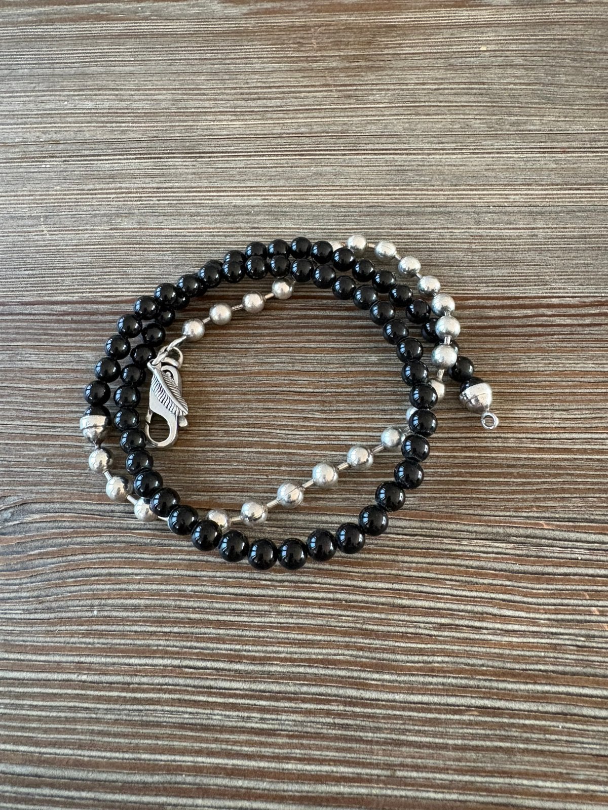 Silk Armband, Sieraden, Tassen en Uiterlijk, Ophalen of Verzenden, Zo goed als nieuw, Zwart, Zilver