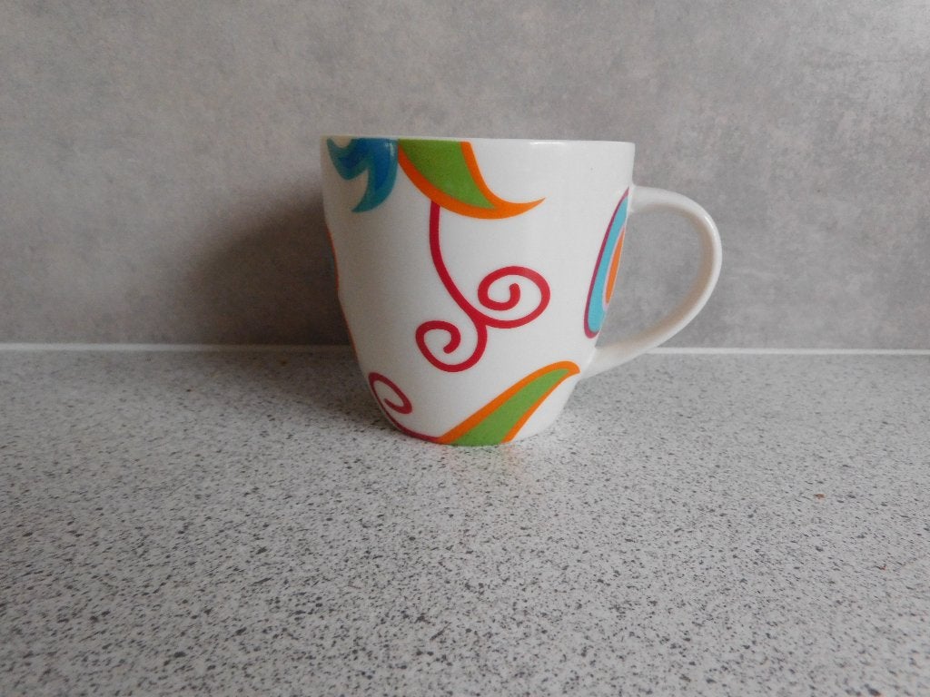 Mok 8x8,5 cm. Bloemen Multicolour Douwe Egberts, Ophalen of Verzenden, Zo goed als nieuw, Overige stijlen, Kop(pen) en/of Schotel(s)