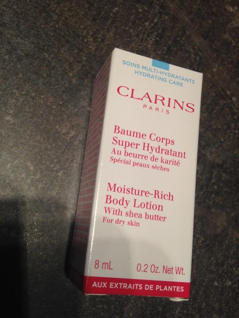 Nieuw Clarins moisture rich body lotion sample, Ophalen of Verzenden, Nieuw, Bodylotion, Crème of Olie