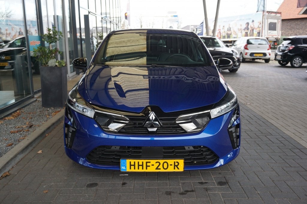 Mitsubishi Colt 1.6 HEV Intense+ Automaat | Navi | Adapt. Cr, Auto's, Mitsubishi, Gebruikt, 4 cilinders, Blauw, Leder en Stof