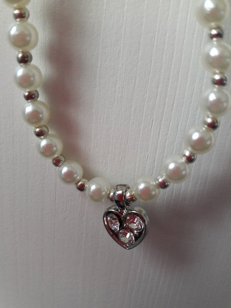 leuke bruidsketting, met diamant hartje. ivoor kleurig, Ophalen of Verzenden, Nieuw, Overige materialen, Met hanger