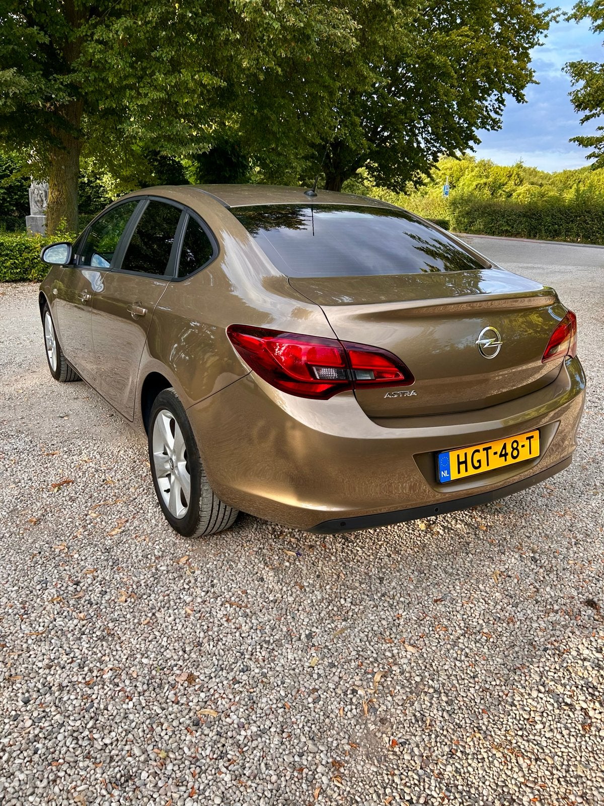 Opel Astra 1.6 Ecoflex 116pk Notchback 2012 Bruin, Auto's, Voorwielaandrijving, 4 cilinders, Bruin, Handgeschakeld