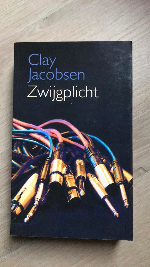 C. Jacobsen - Zwijgplicht, Boeken, Thrillers, Zo goed als nieuw, Ophalen of Verzenden