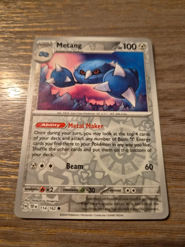 Pokémon Kaart Metang 114/162 - TEF, Ophalen of Verzenden, Zo goed als nieuw, Losse kaart, Foil