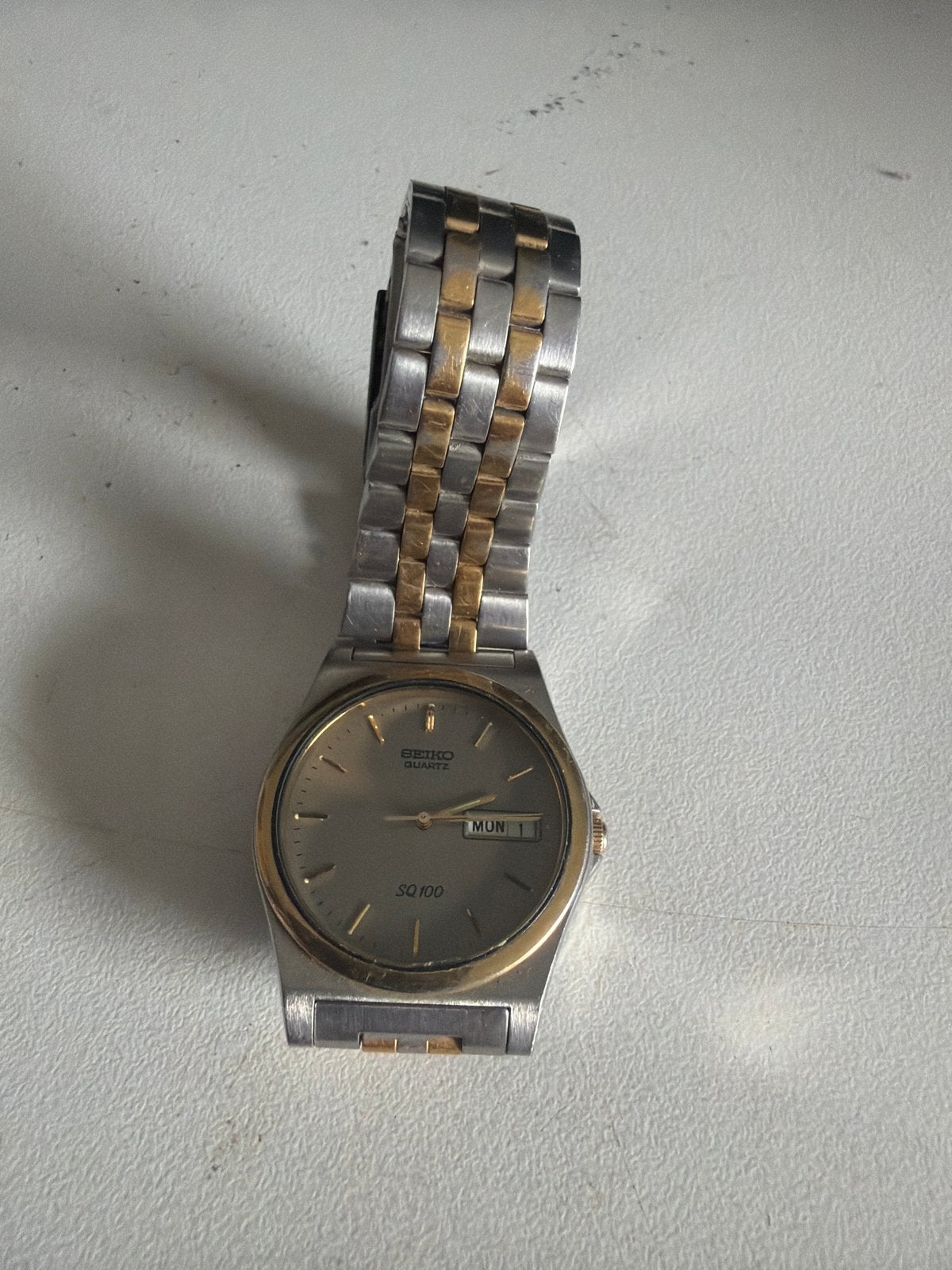 Seiko Quartz SQ 100 Herenhorloge - Staal/Goudkleurig, Seiko, Gebruikt, Staal, Polshorloge