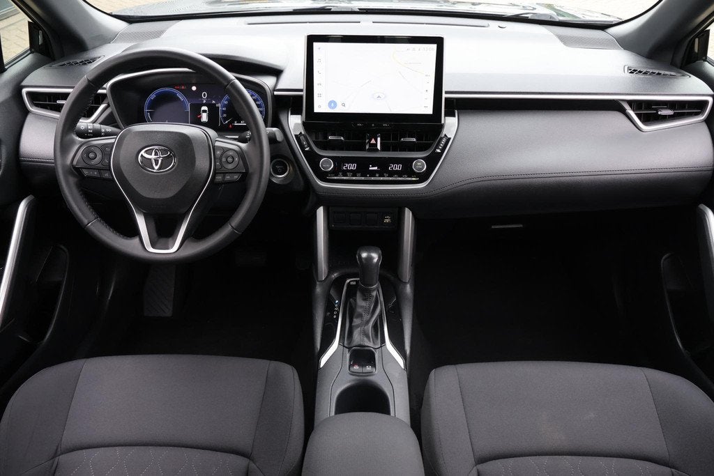 Toyota Corolla Cross 2.0 High Power Hybrid Active 1e Eigenaa, Auto's, Toyota, Stof, Gebruikt, 4 cilinders, Automatische klimaatregeling