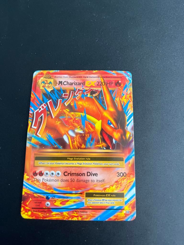 Pokémon M Charizard EX, Ophalen of Verzenden, Gebruikt, Losse kaart