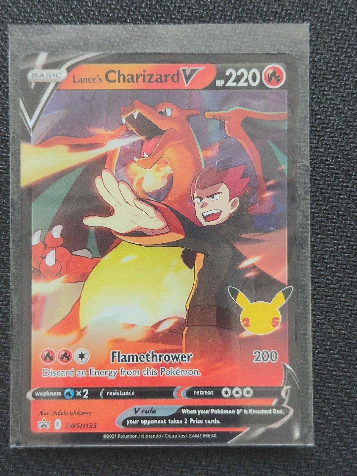 Lance's Charizard V SWSH133 Celebrations NM Pokémon Kaart, Ophalen of Verzenden, Zo goed als nieuw, Losse kaart