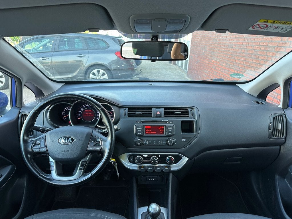 Kia Rio 1.2 CVVT BusinessLine / Airco / 5DRS / Cruise / AUX, Auto's, Kia, 4 cilinders, Met garantie (alle), Blauw, Origineel Nederlands