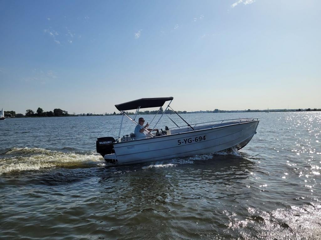 Nette Qwest 50R met Df 50 Suzuki en trailer., Overige typen, Ophalen of Verzenden, Zo goed als nieuw, Met peddels