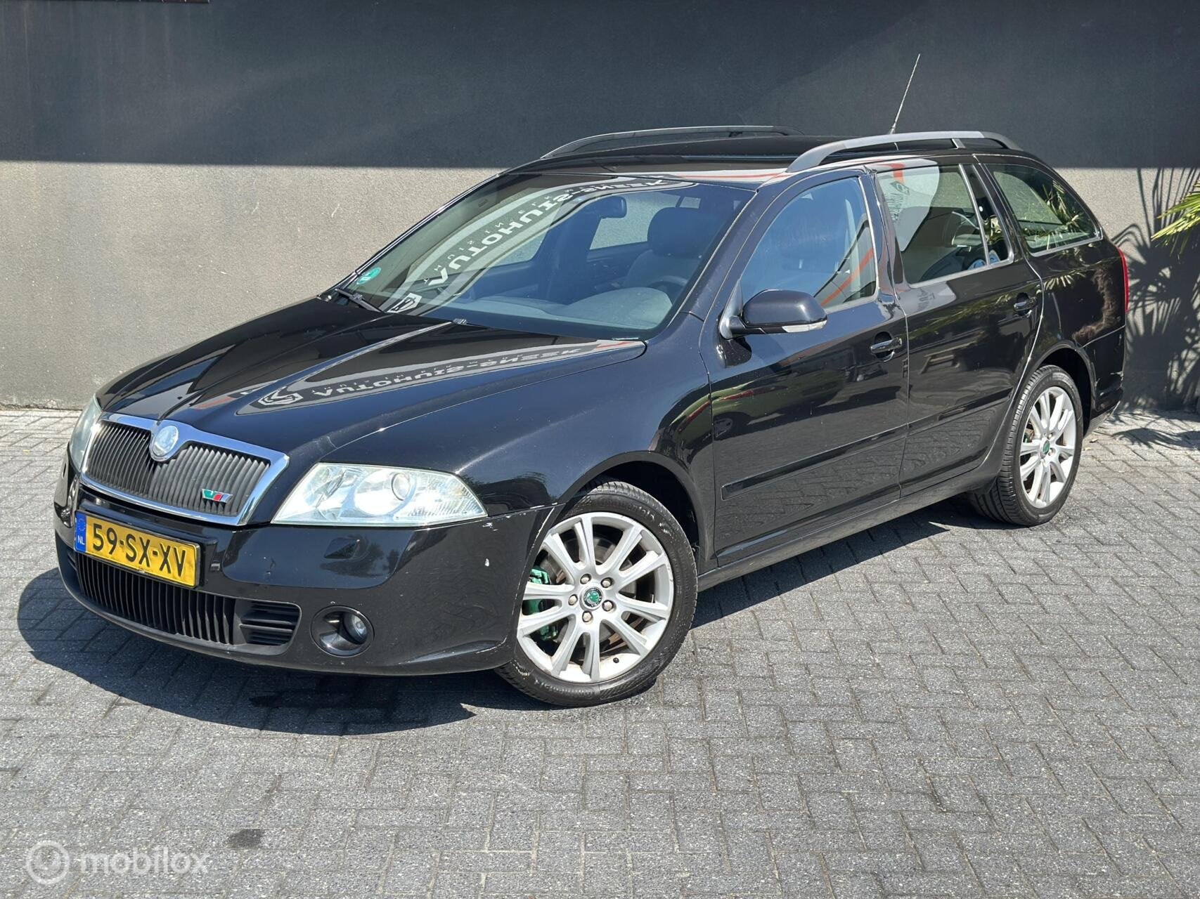Skoda Octavia Combi RS|200PK | Xenon| Trekhaak |Sportstoelen, Gebruikt, 4 cilinders, 1984 cc, Zwart
