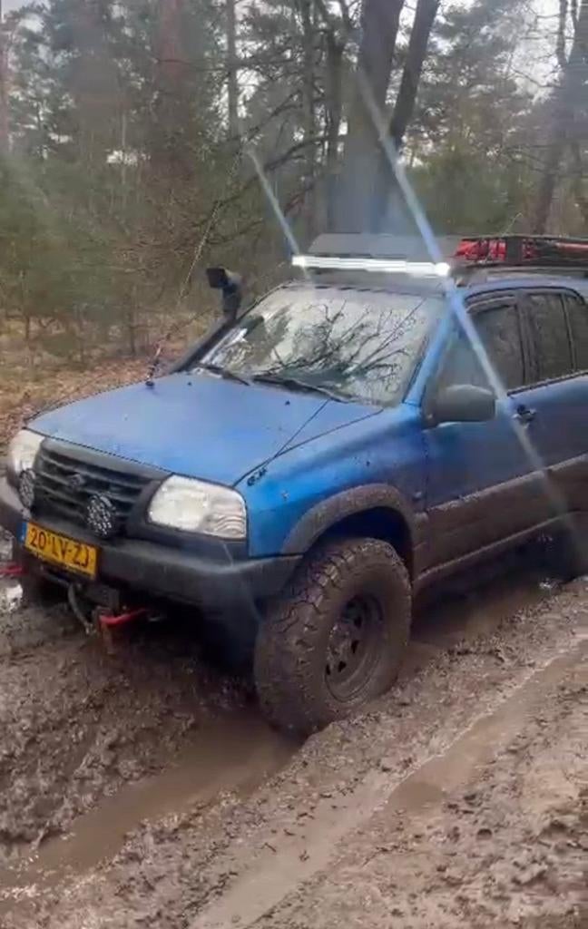 Suzuki Grand Vitara 2.5 V6 5D AUT 2003 Blauw, Automaat, 1380 kg, Origineel Nederlands, Vierwielaandrijving
