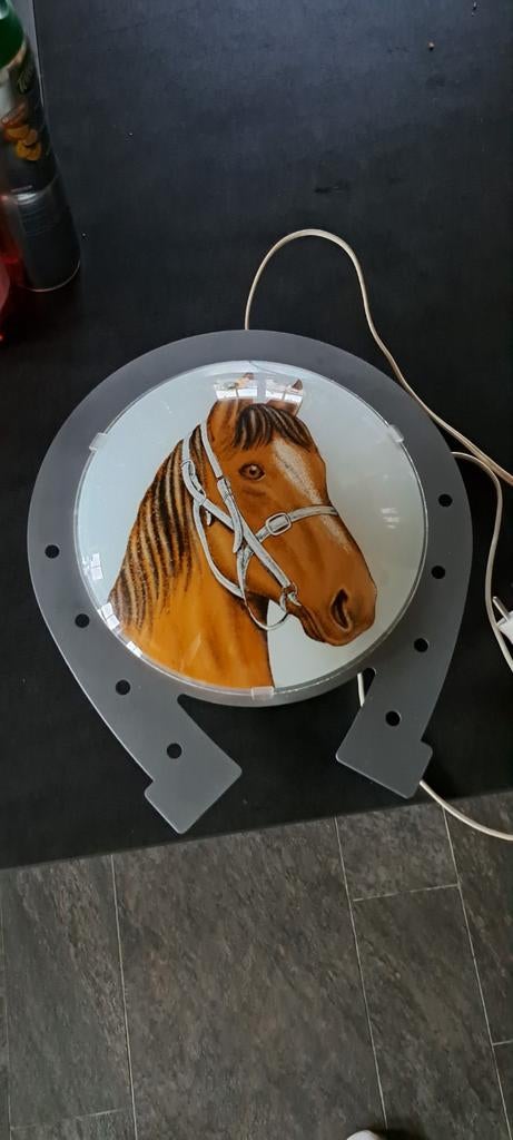 Wandlamp paard, Ophalen