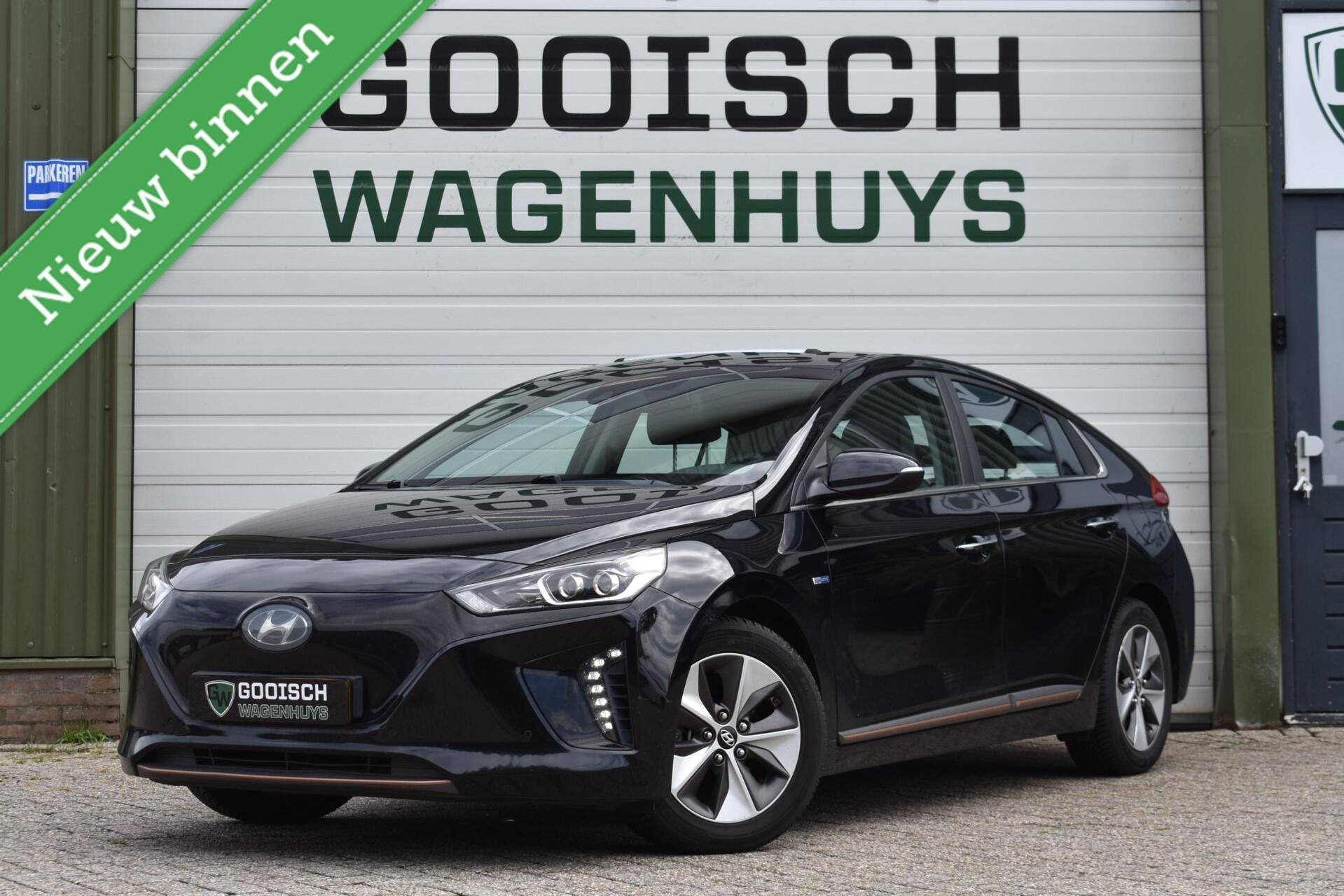 Hyundai IONIQ Premium EV | Schuifdak | Leder | Memory | Infi, 280 km, Met garantie (alle), Zwart, IONIQ
