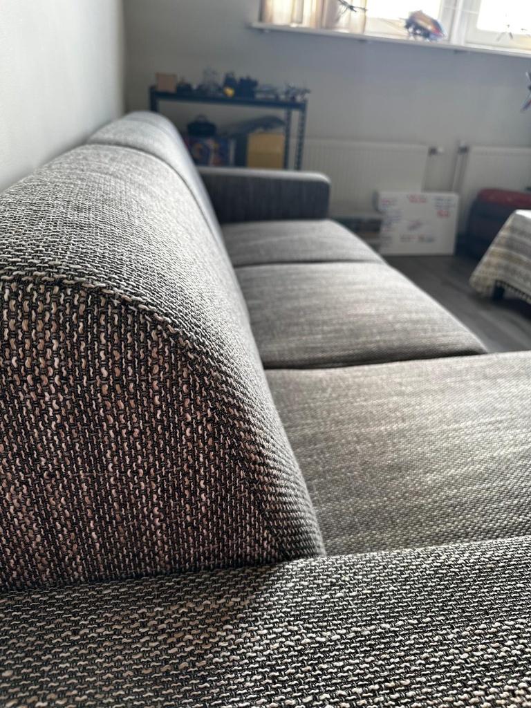 Hoek bank lounge grijze grote sofa, Ophalen, 100 tot 125 cm, Zo goed als nieuw, 200 tot 250 cm