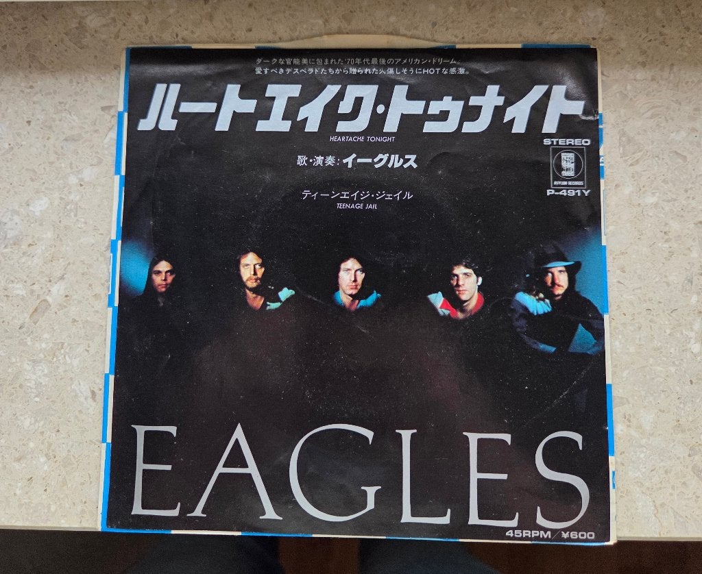 Eagles - Heartache Tonight ( JAPAN ), 7 inch, Beschermende buitenhoes, Ophalen of Verzenden, Zo goed als nieuw